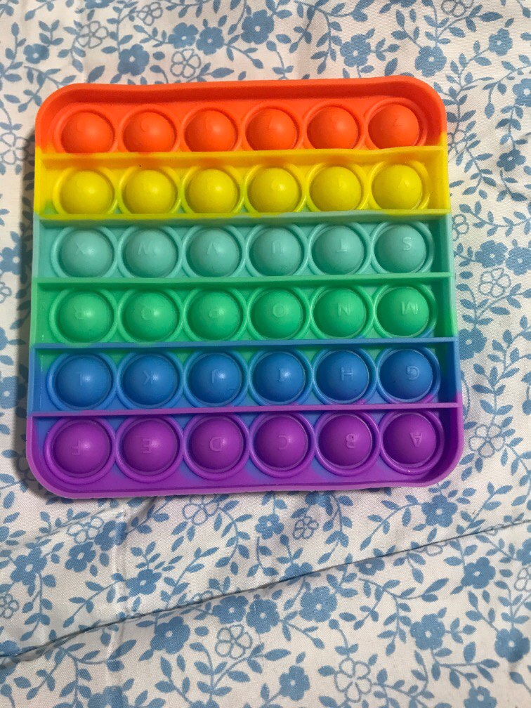 ABC pop it with rainbow colours, Hobbies & Toys, Toys & Games on Carousell