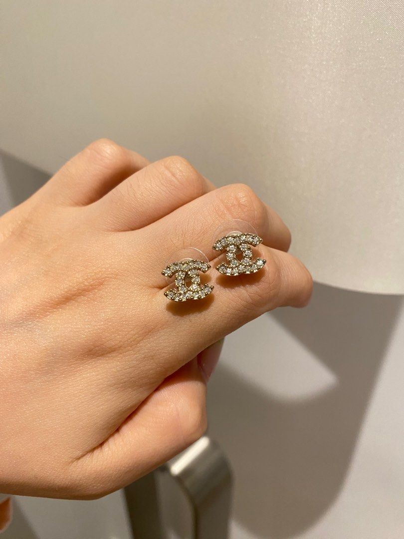 Chanel cc 2025 earrings on ear