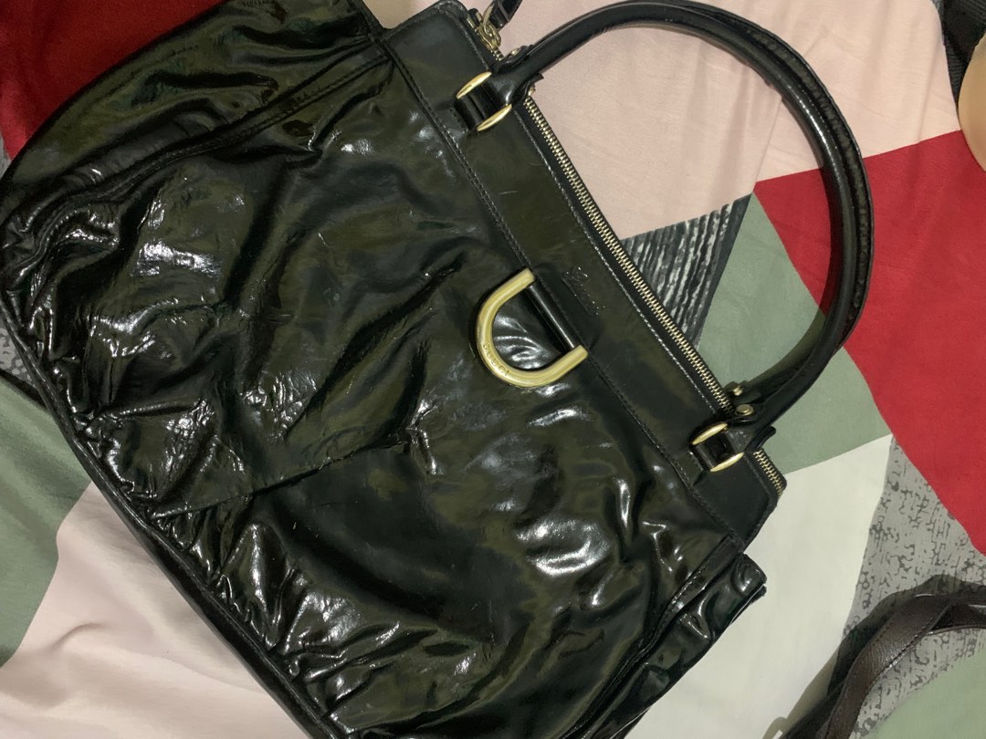 Gucci patent leather ykk zip coded on Carousell