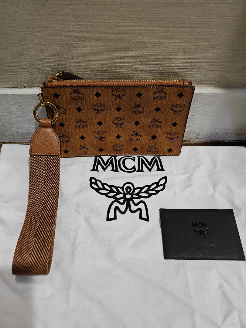 MCM Clutch Bag, Women's Fashion, Bags & Wallets, Clutches on Carousell