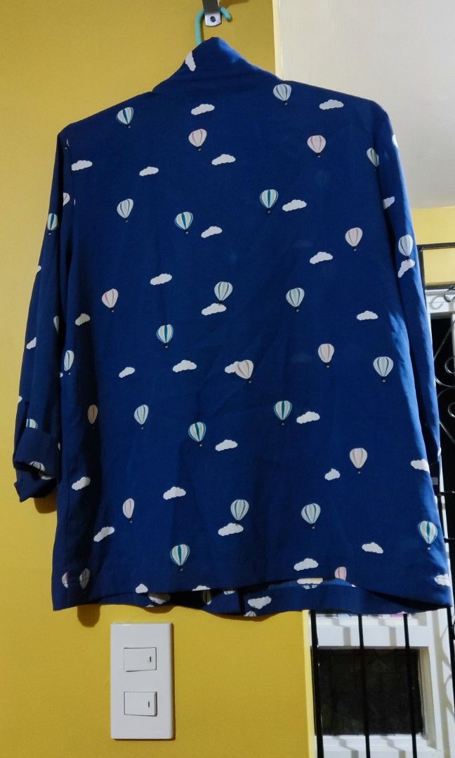 Nice office/casual wear blue blouse (Category: Blouses) located in Angono. Submitted by bblossom21 (Listing ID 1235342991, Image 1). Description: pretty top with cute hot air balloon design.💕🧡.