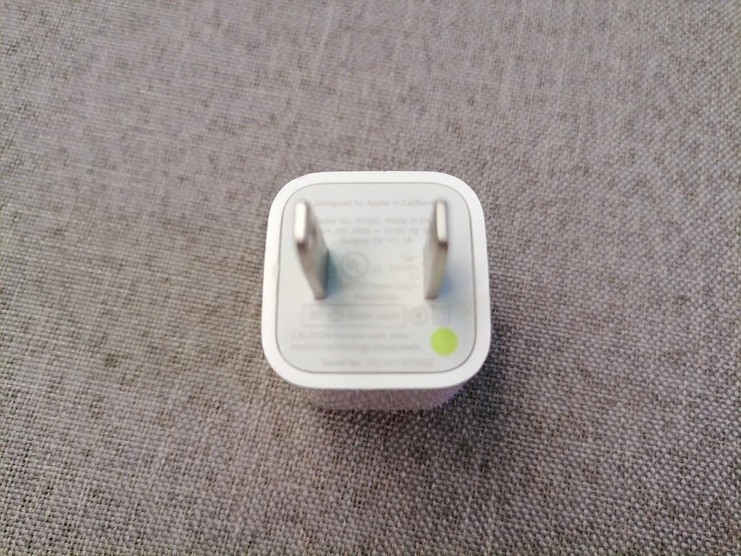 Original iPhone and Apple Watch Adopter (Category: Chargers & Cables) located in Imus. Submitted by glry_shop (Listing ID 1235353006, Image 2). Description: Working and in good condition. No issues were detected..