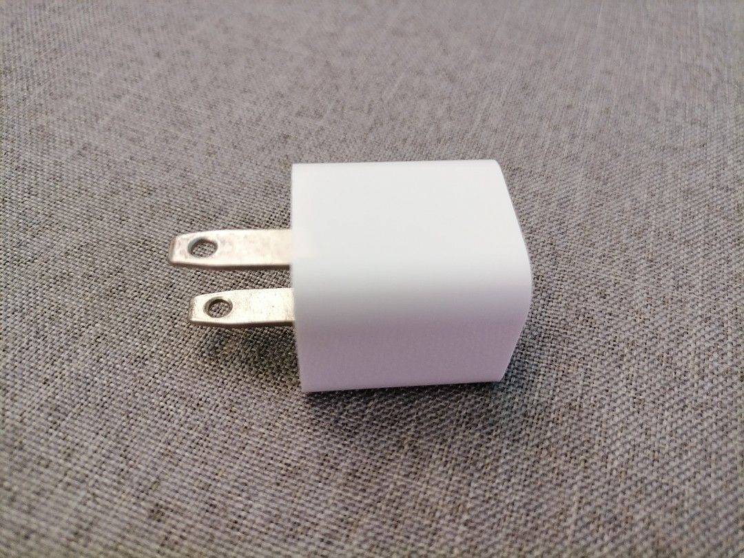 Original iPhone and Apple Watch Adopter (Category: Chargers & Cables) located in Imus. Submitted by glry_shop (Listing ID 1235353006, Image 1). Description: Working and in good condition. No issues were detected..