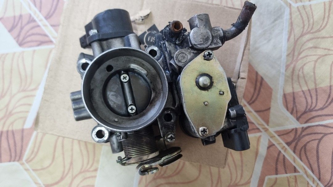 PROTON WIRA 1.3/1.5 THROTTLE BODY (ORIGINAL), Auto Accessories on Carousell
