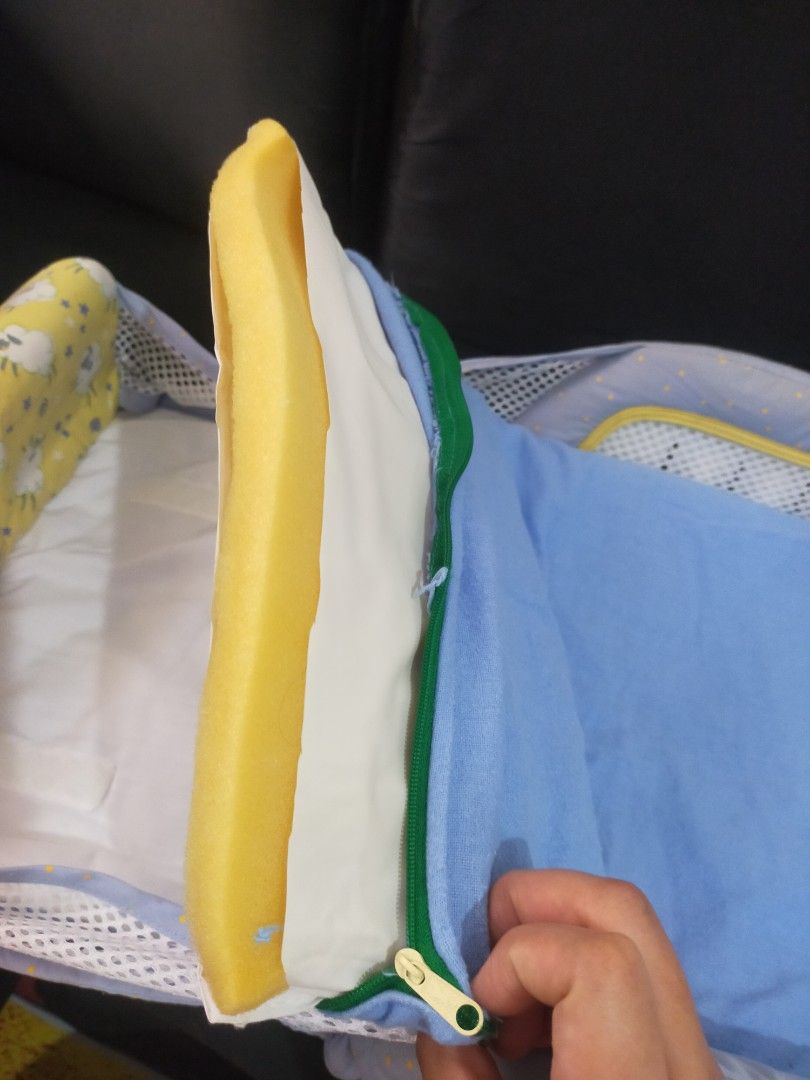 The First Years Close and Secure Sleeper (Category: Children's Beds) located in Quezon City. Submitted by rnabc (Listing ID 1235489862, Image 3). Description: Help me find this a new home. Very useful esp for travelling when you want to create an immediate bed space for your little one. With extra yellow cover but the zipper is broken. Needs wash/cleaning. Not sure if the light is still functioning. issue tastas na yung cover na white ng foam per