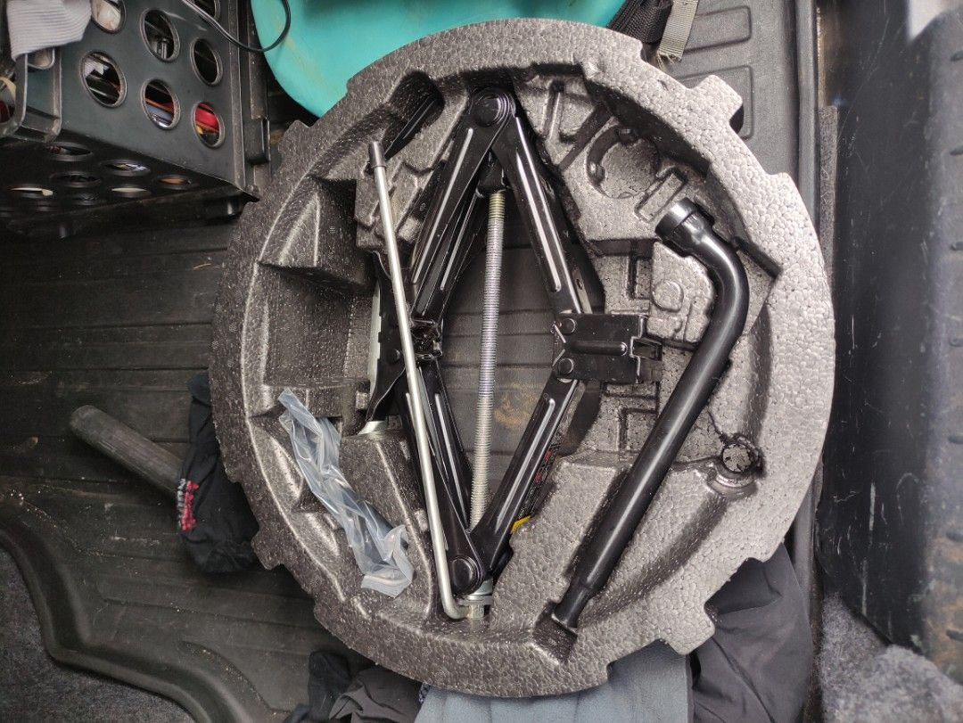 Volvo XC40 spare tire tool set (Category: Other Automotive Parts and Accessories) located in Paranaque City. Submitted by mispelled (Listing ID 1235397526, Image 3). Description: Selling a tool set for spare tire space. Fits Volvo XC40 Size R18. Can fit other cars with R18 wheel size. #sweldona.