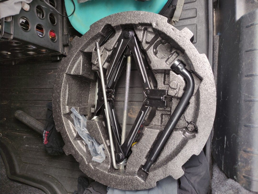 Volvo XC40 spare tire tool set (Category: Other Automotive Parts and Accessories) located in Paranaque City. Submitted by mispelled (Listing ID 1235397526, Image 2). Description: Selling a tool set for spare tire space. Fits Volvo XC40 Size R18. Can fit other cars with R18 wheel size. #sweldona.