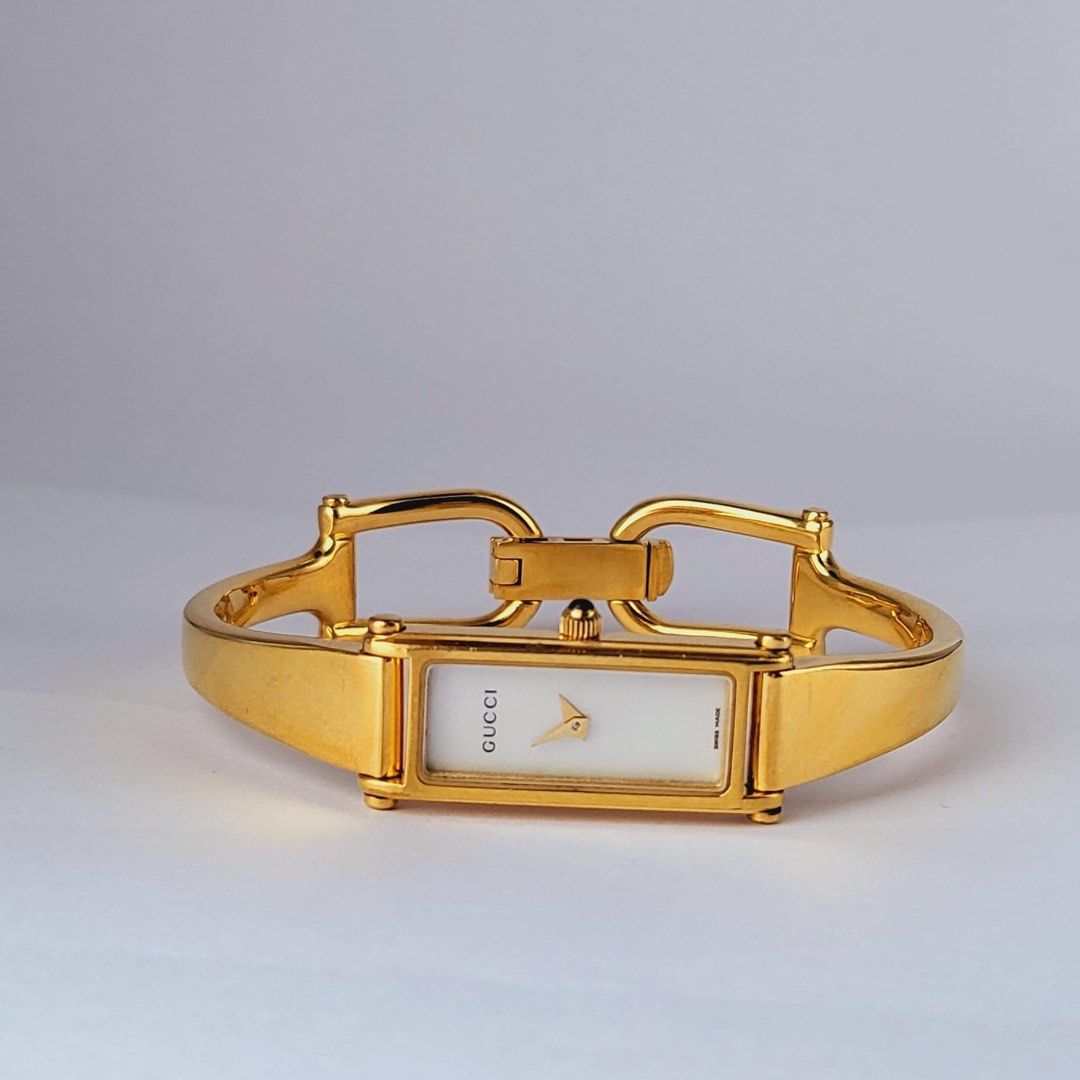 Authentic Gucci 1500L mother of pearl dial bangle watch
