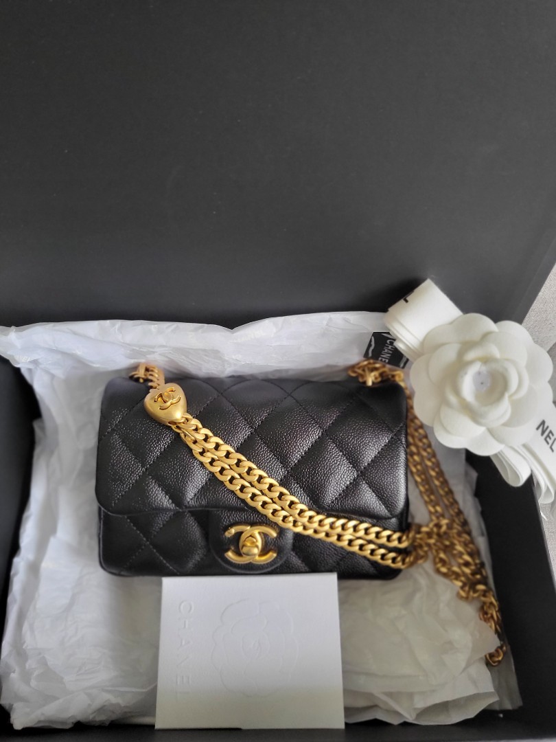 Authentic Chanel 23P Heart Adjustable Chain Black Caviar Mini Flap Bag with  Gold Hardware, Luxury, Bags & Wallets on Carousell