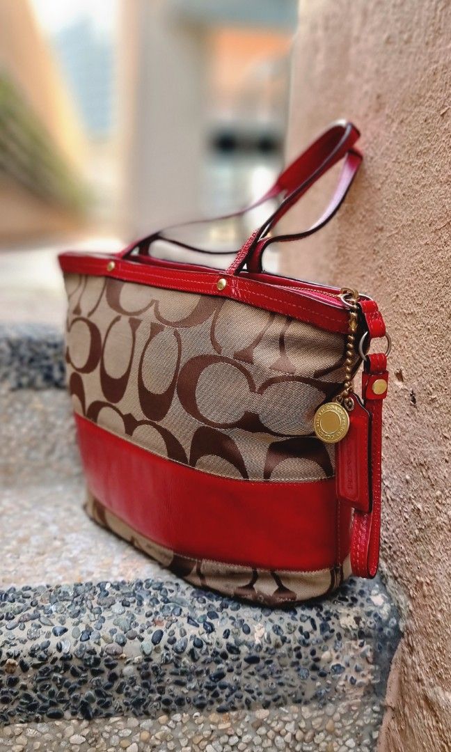 Coach purse with red sale stripe