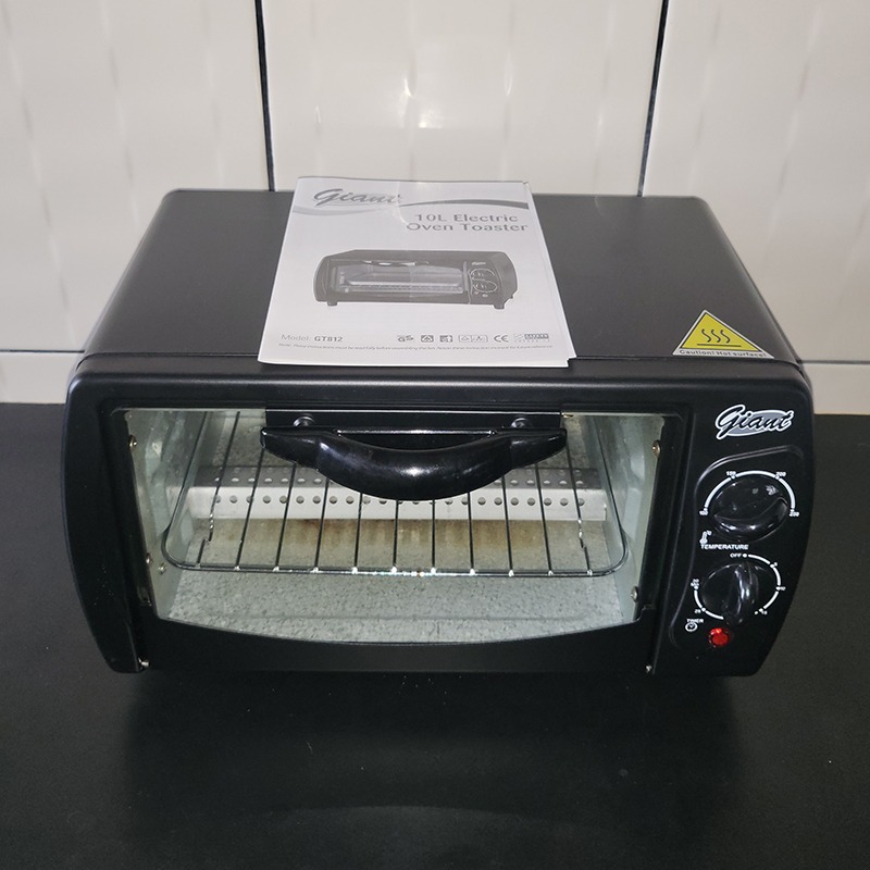 Lightly used Giant toaster oven black 10l with manual, TV & Home Appliances, Kitchen Appliances