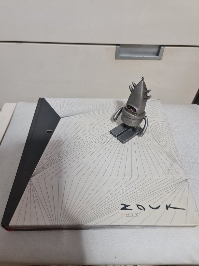 Limited edition Zouk Anniversary coffee table book and figurine