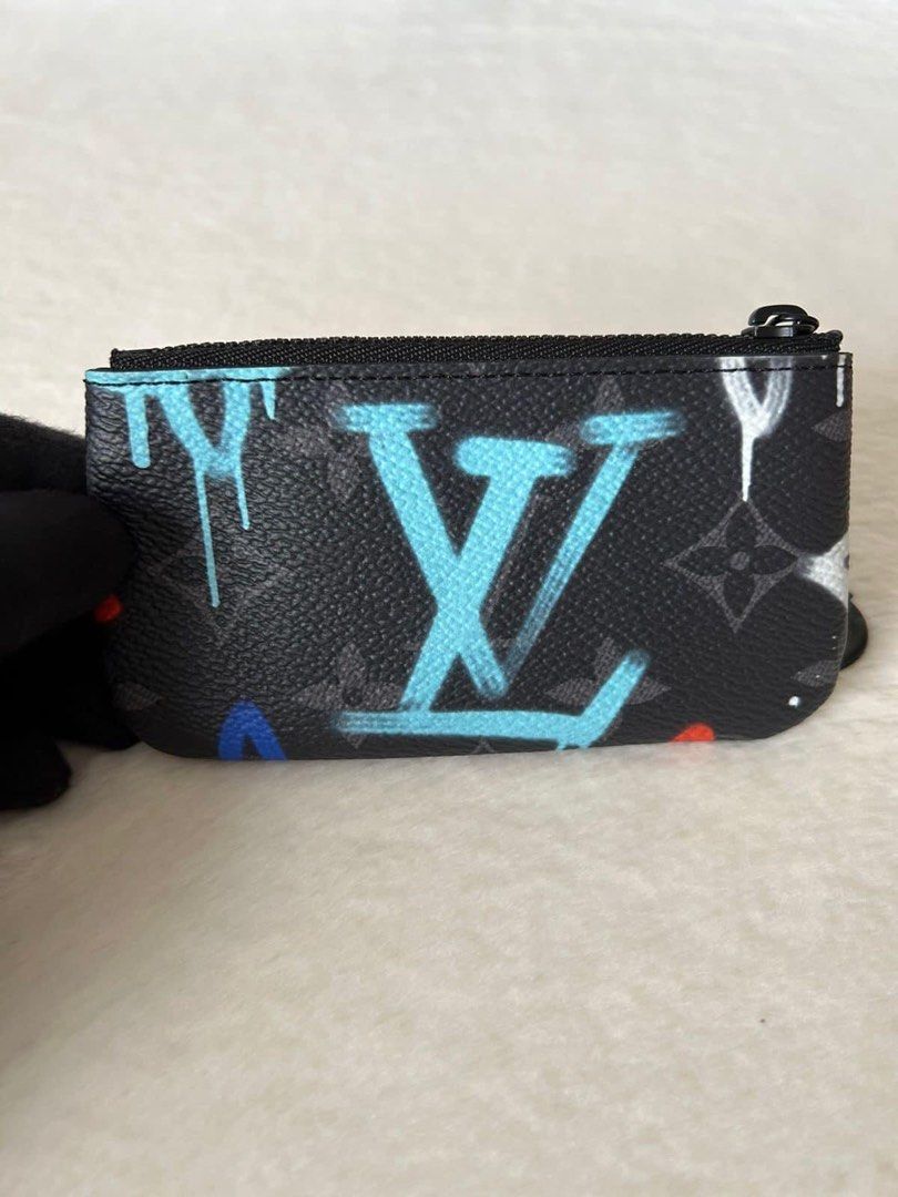 Louis Vuitton Multicolour Graffiti Key Pouch (Category: Luxury Bags & Wallets) located in Manila. Submitted by bagislifeshop (Listing ID 1240251223, Image 2). Description: ▪️Louis Vuitton Multicolour Graffiti Key Pouch▪️ ☑️Available in Pampanga ✅Date code: CT4272 ✅Condition: 8.8/10 ✅Material: Monogram eclipse canvas ✅Color: Black/LV Graffiti Orange ✅Inclusion: In- house dustbag .