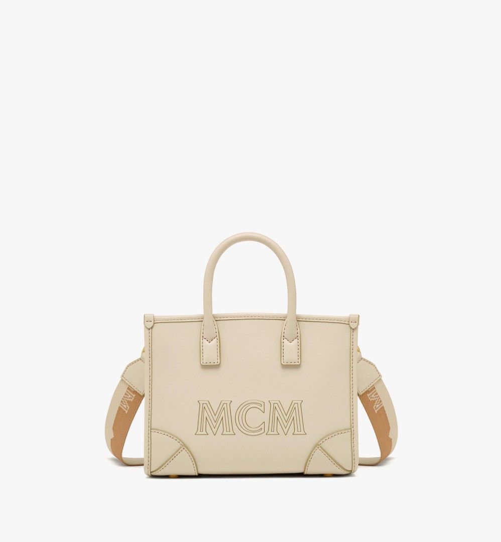 Cream mcm bag clearance