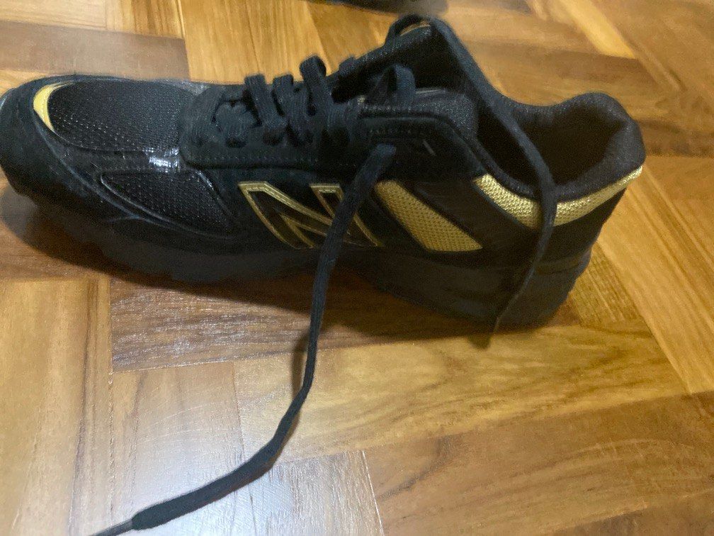 Black and gold new shop balance 990