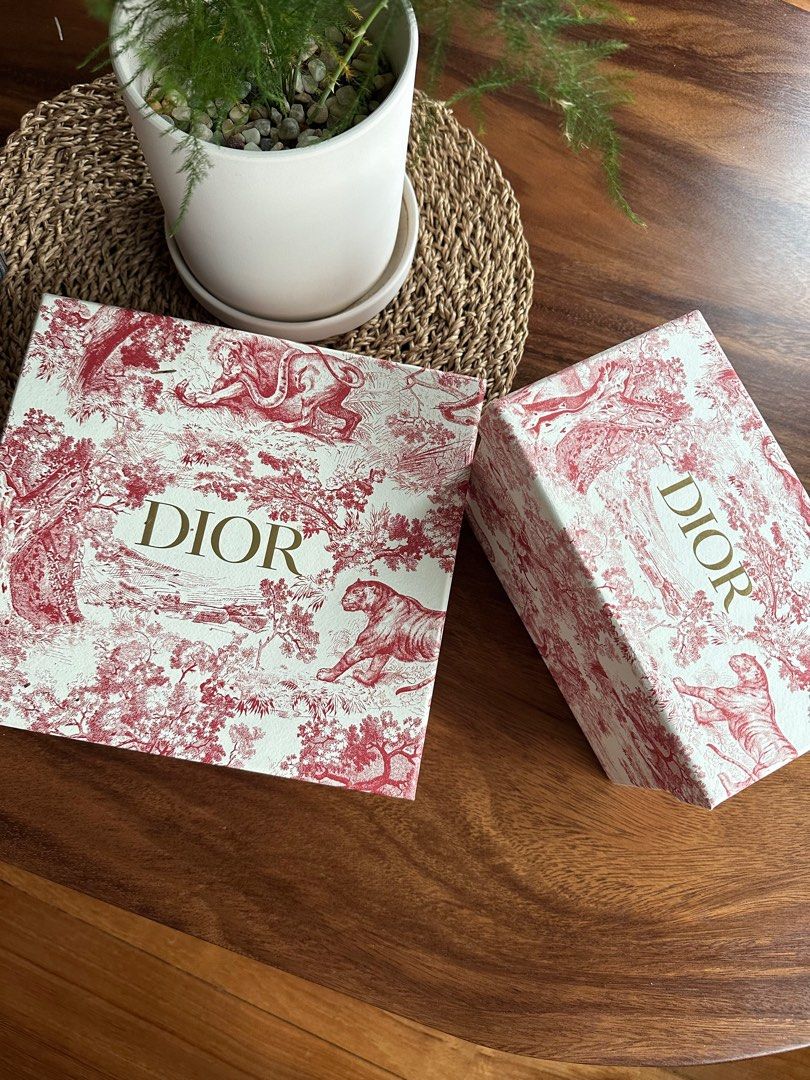Christian Dior coffee cups and plates (x2)