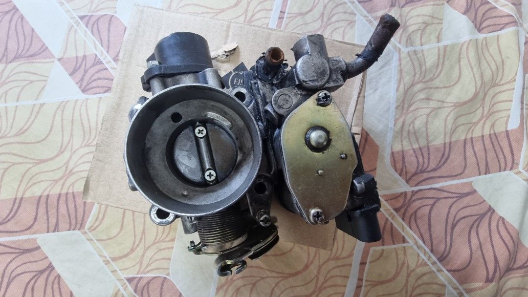 PROTON WIRA 1.3/1.5 THROTTLE BODY (ORIGINAL), Auto Accessories on Carousell