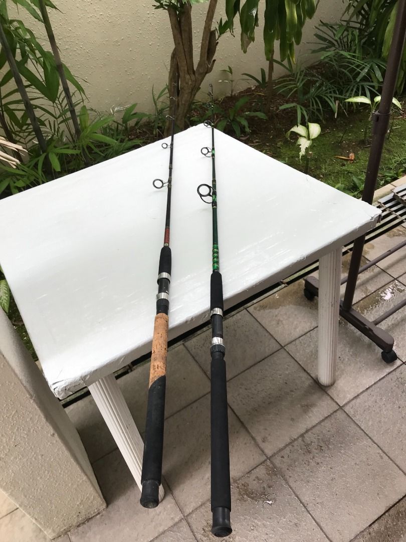 SureCatch fishing rod 215cm long and White Rabbit 183cm., Sports