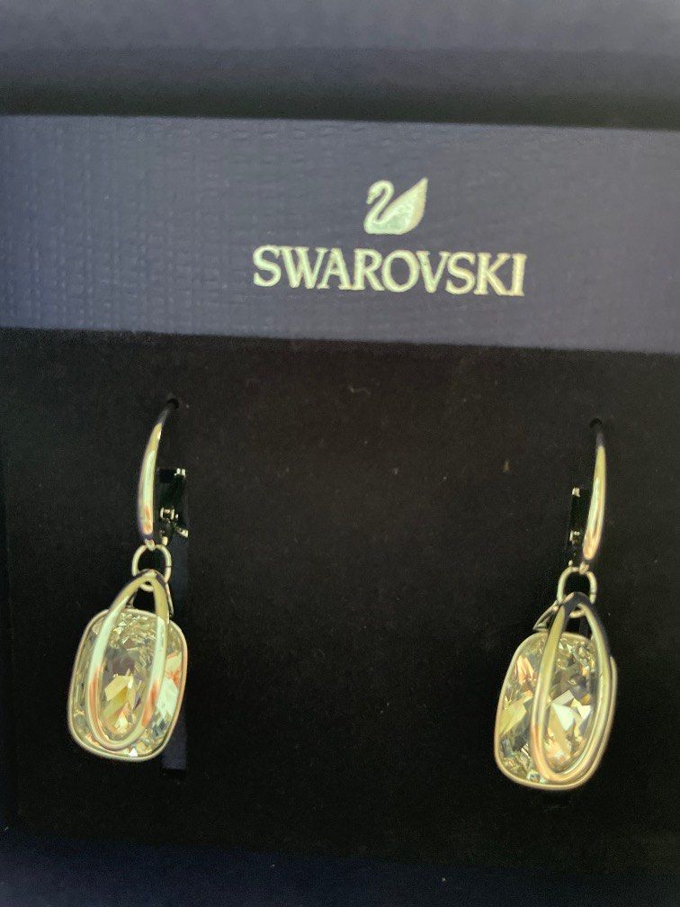 Swarovski holding earrings sale