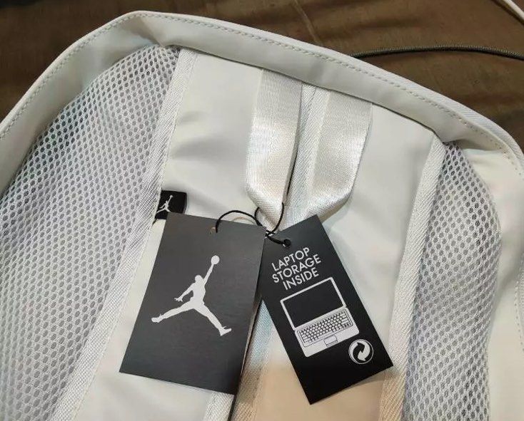 White and gold jordan backpack top