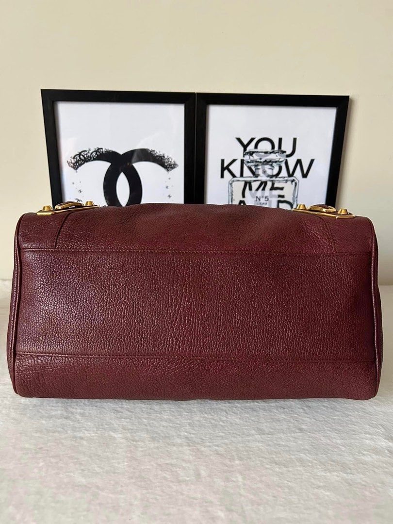 Balenciaga Metallic Edge Velo (Category: Luxury Bags & Wallets) located in Manila. Submitted by bagislifeshop (Listing ID 1232485620, Image 3). Description: ▪️Balenciaga Metallic Edge Velo▪️ ☑️Available in Manila ✅Condition: 8.5/10 ✅Colour: Maroon in Gold hardware ✅Material: Goatskin leather ✅Inclusions: Mirror and long strap .