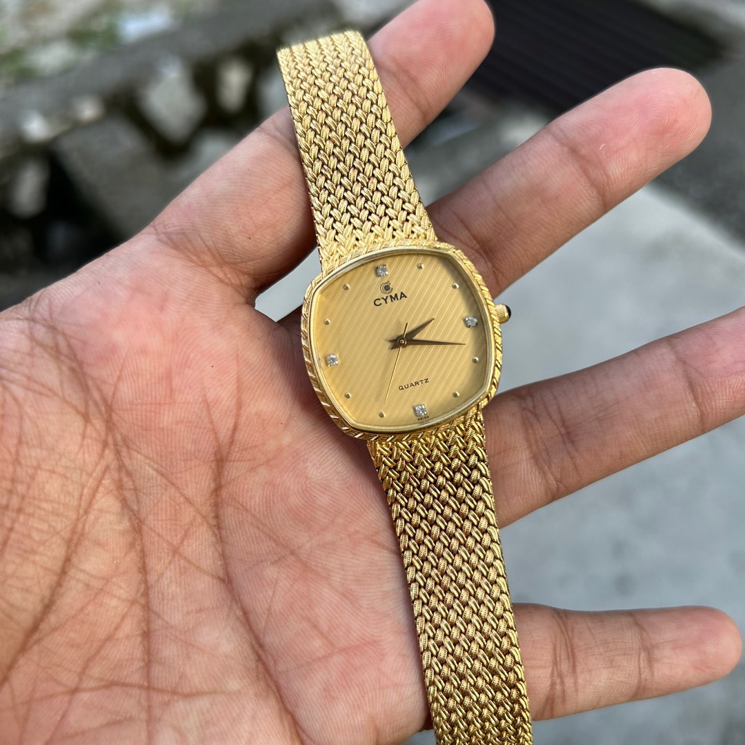 Cyma quartz gold online watch