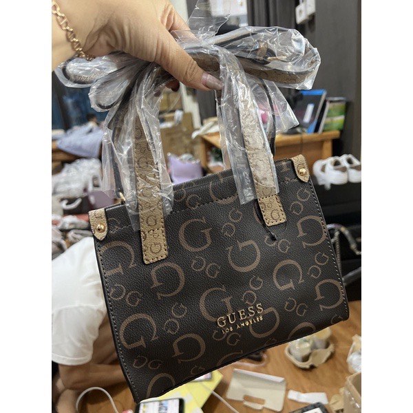 Guess mini tote on Carousell