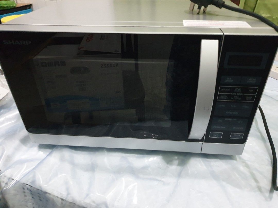Lightly used Sharp R202ZS Microwave Oven (20L), TV & Home Appliances
