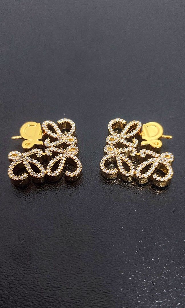LOEWE Anagram crystal-embellished earrings (Category: Luxury Accessories) located in Caloocan City. Submitted by babe.mine (Listing ID 1235727264, Image 1). Description: These earrings from Loewe are made in Italy from sterling silver in the house's distinctive Anagram silhouette with sparkling crystal embellishment. Suitable for pierced ears, they have pin fastening. Made in Italy Length 2cm-1" Width 0,4cm-0" Depth 2cm-1" Sale no inclusions.