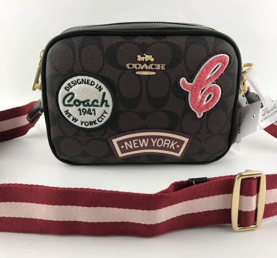 Mini Jamie Camerabag (Category: Luxury Bags & Wallets) located in Rizal. Submitted by onlinedepotwholesale2nd (Listing ID 1235707116, Image 1). Description: Mini Jamie Camerabag in signature canvas with ski patches 7 1/2” (L) x 5 1/4” (H) x 2 1/4” (W) CF455 2100.