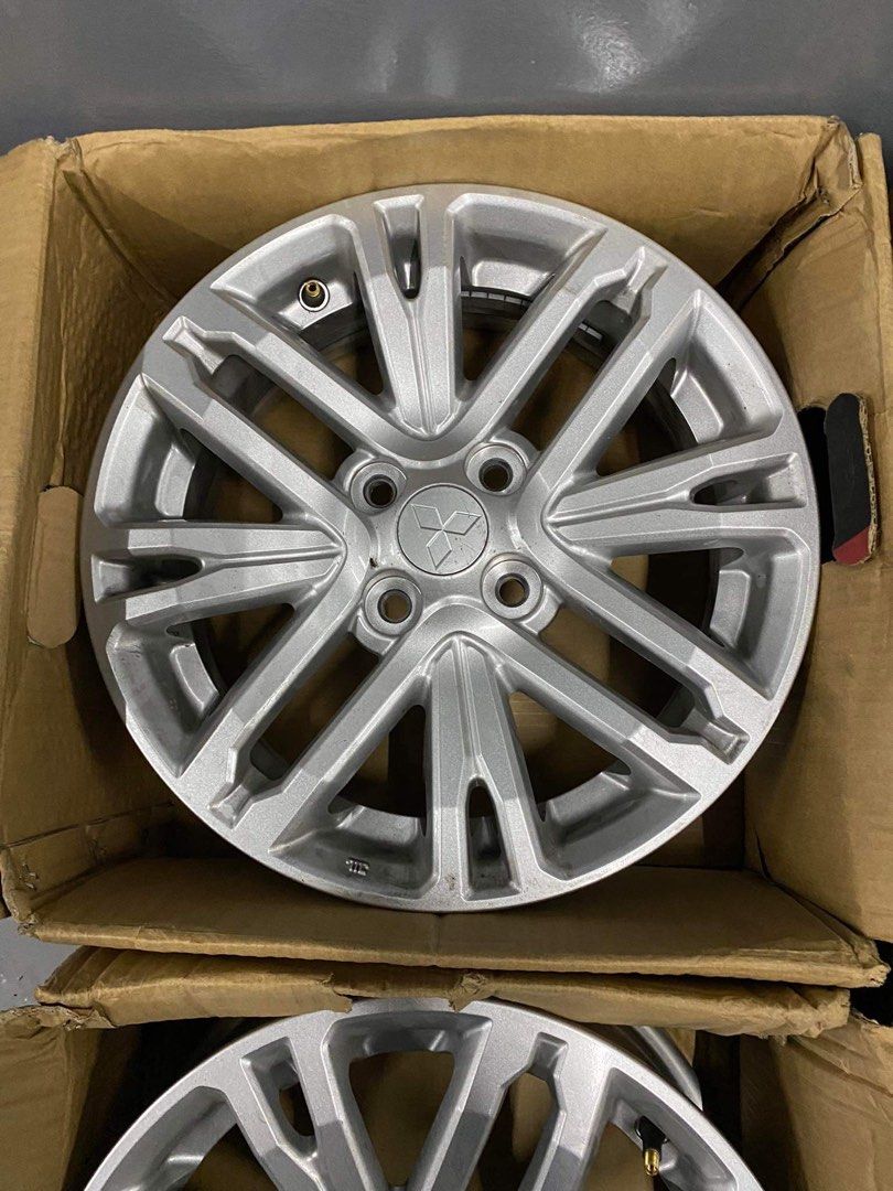 Mirage g4 stock mags, Car Parts & Accessories, Mags and Tires on Carousell