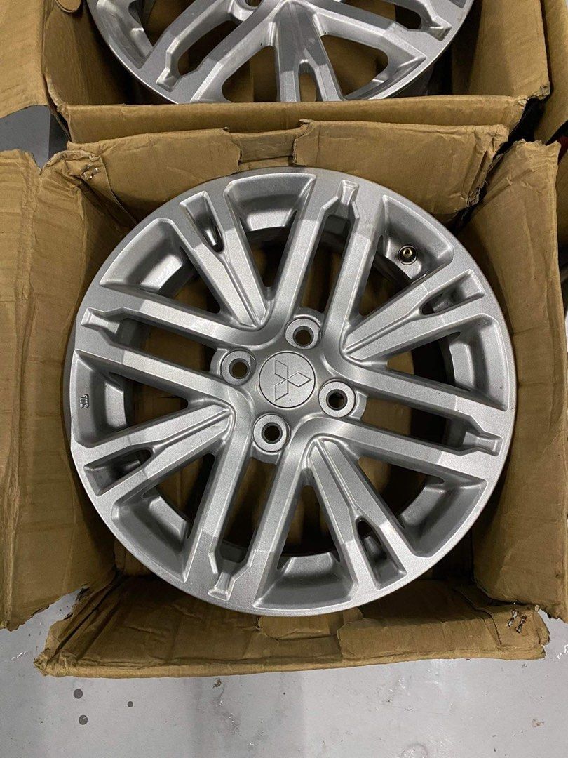 Mirage g4 stock mags, Car Parts & Accessories, Mags and Tires on Carousell