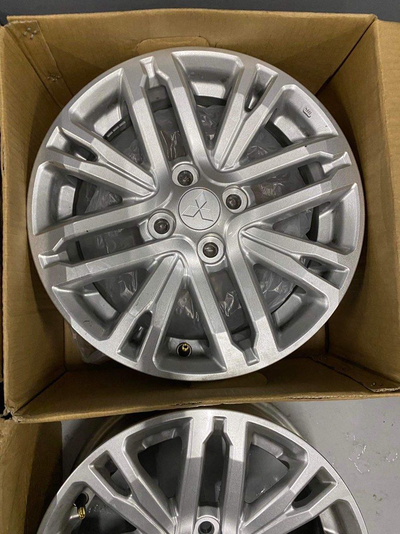 Mirage g4 stock mags, Car Parts & Accessories, Mags and Tires on Carousell