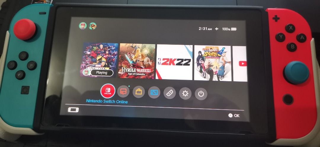 Nintendo switch v2 (Category: Nintendo) located in Pasay City. Submitted by venomivy (Listing ID 1235853950, Image 1). Description: Nintendo Switch V2 10k 128gb mmc Temp glass installed With box and complete accessories Digital games included Nba 2k22 Demon slayer with all dlc character Pack. Add ons: take all for 3500 Switch joycons red and blue with grip and straps. Skull & co tempered glass 1 pc 2 pcs skull & co carrying case (large black & de