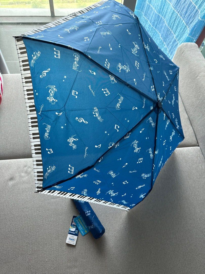 Piano design umbrella, Hobbies & Toys, Travel, Umbrellas on Carousell