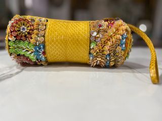 Snakeskin leather embellished with beads, sequins wristlet