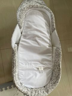 Snuggle nest baby cot
