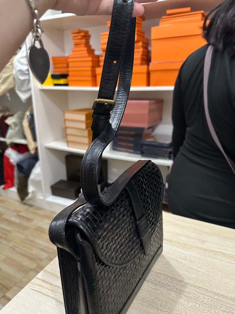 VINTAGE FENDI sling (Category: Luxury Bags & Wallets) located in Manila. Submitted by davidspreowned (Listing ID 1235750921, Image 3). Description: Vintage Fendi weave like bottega veneta with sling structured can stand alone black no more inclusion .