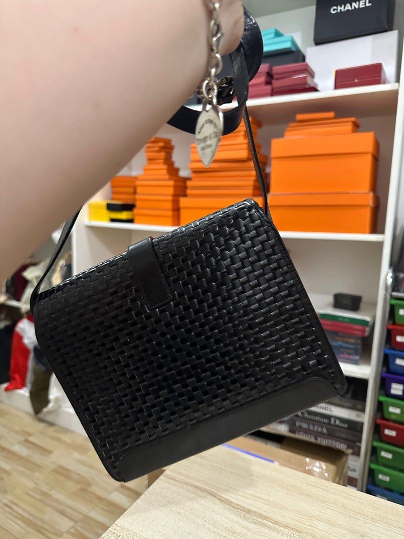 VINTAGE FENDI sling (Category: Luxury Bags & Wallets) located in Manila. Submitted by davidspreowned (Listing ID 1235750921, Image 2). Description: Vintage Fendi weave like bottega veneta with sling structured can stand alone black no more inclusion .
