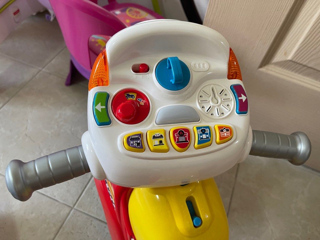 vtech step and roll motorbike
