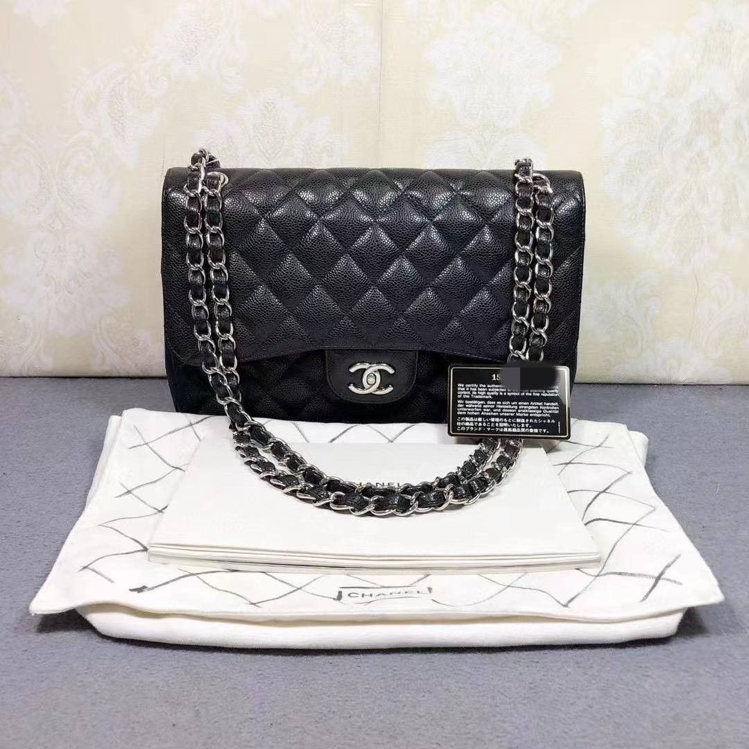 Classic flap chanel jumbo caviar preloved silver hardware, Luxury, Bags &  Wallets on Carousell