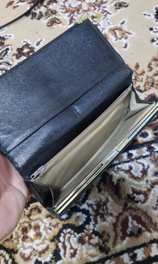 Givenchy (Category: Luxury Bags & Wallets) located in Manila. Submitted by mistej (Listing ID 1236060860, Image 3). Description: givenchy large wallet with coin compartment card slot authentic minor flaws chekndetaild pic for isues.