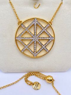 JUICY COUTURE gold tone round pendant necklace