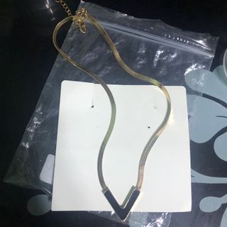 Letter “V” pendant necklace
