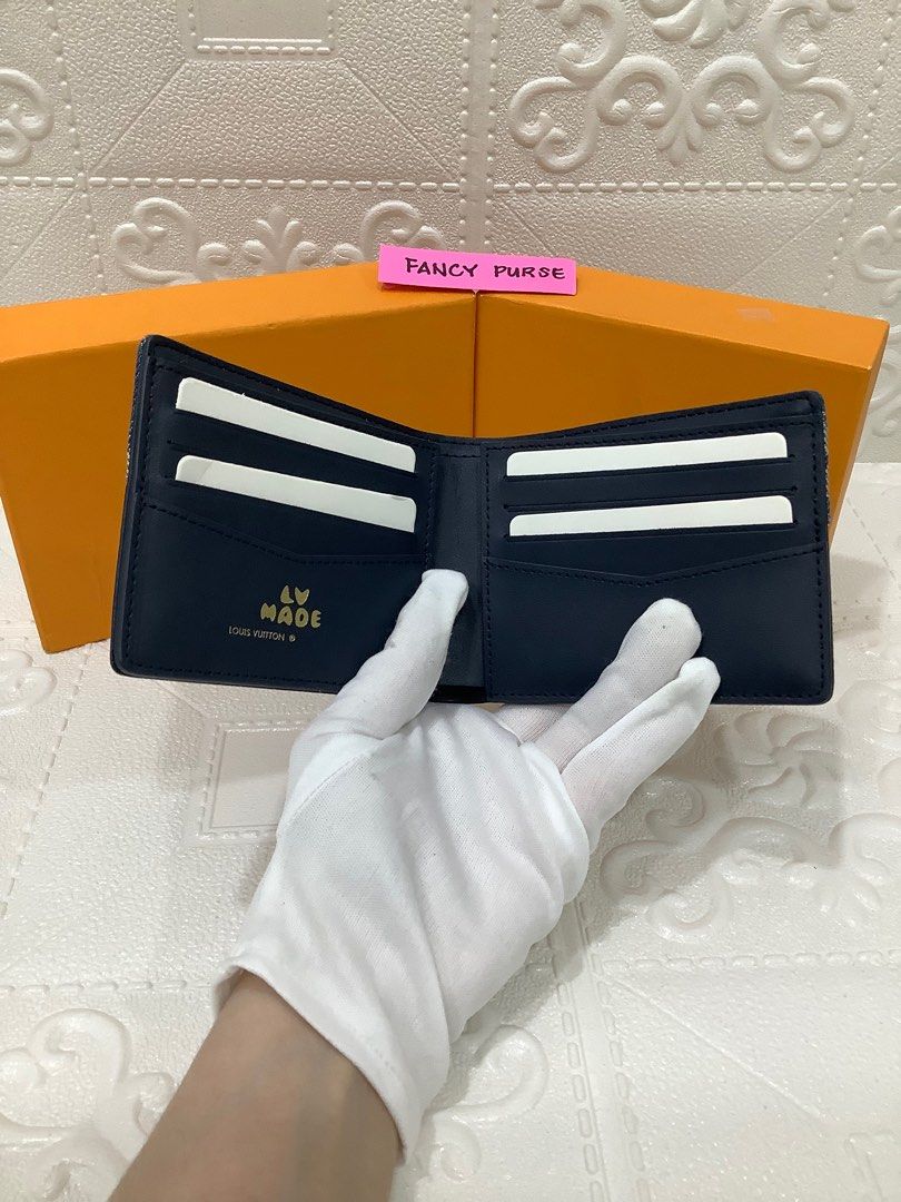 Authenticated Louis Vuitton Nigo Monogram Denim Slender Wallet