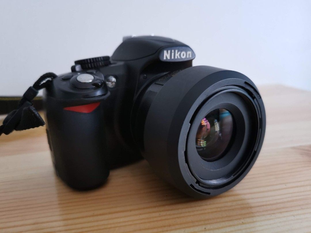 Nikon D3100 With 35mm 1 8g Lens And Kit Lens On Carousell Nikon D3100 With 35mm 1 8g Lens And Kit Lens On Carousell