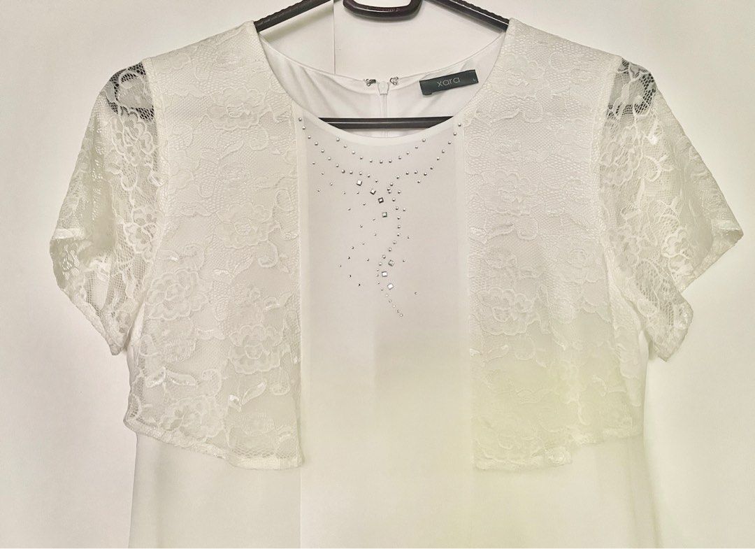White semi-formal Dress (Category: Dresses) located in Cainta. Submitted by jdcmd (Listing ID 1236036963, Image 2). Description: Xara white semi formal dress Unused, tag removed only Size L SF c/o buyer via lalamove, grab or lbc No COD or COP Payment first basis MOP: Gcash or BDO bank tranfer Cainta, Rizal.