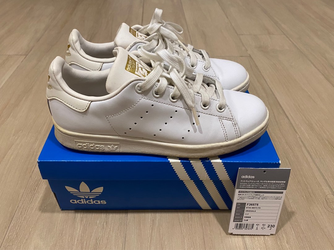 Stan smith white black gold deals