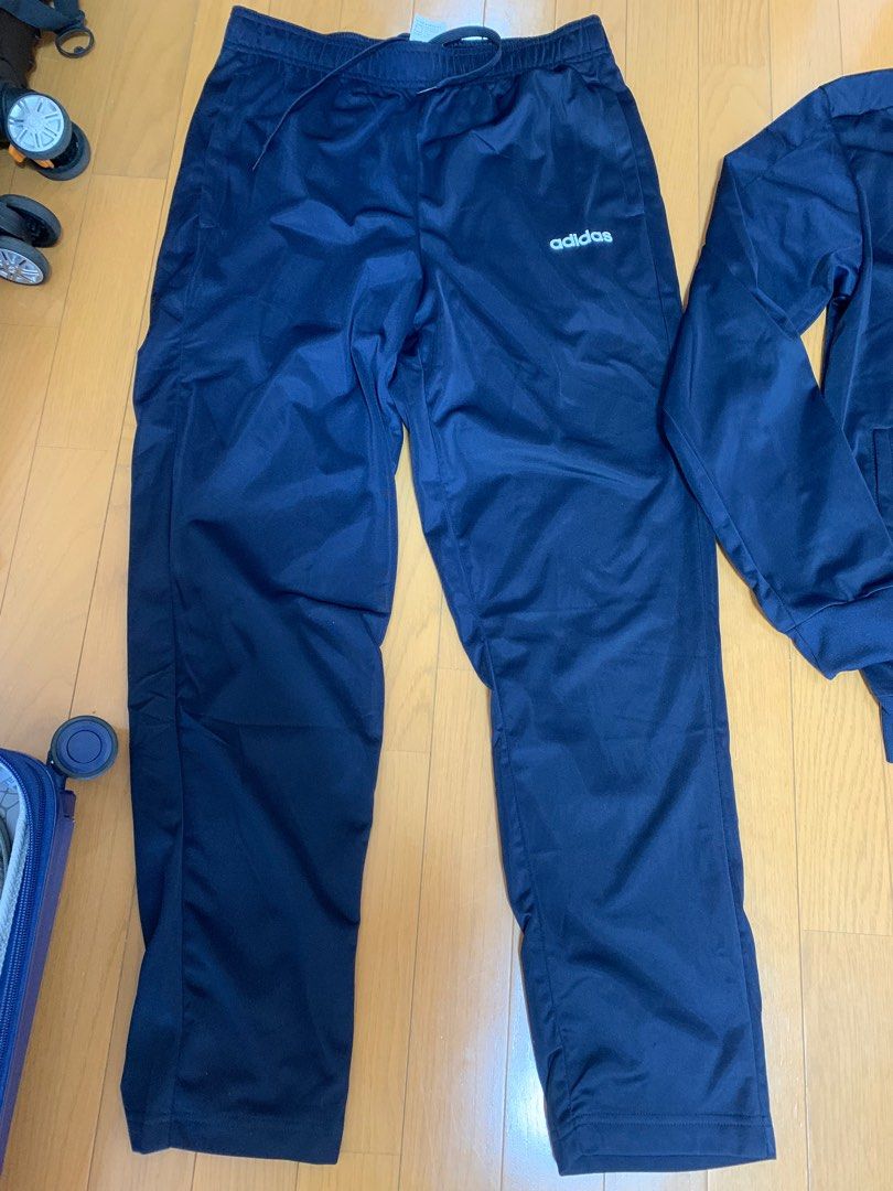 ADIDAS Men’sTrack Suit (Authentic) (Category: Sets & Coordinates) located in Manila. Submitted by arisofcalico (Listing ID 1236079359, Image 3). Description: Authentic Adidas Men’s Track Suit Color: LegInk/Navy Blue Size XXL, Asian Size Good, quality fabric Selling as set, imported items bought from Japan, given as a present Unstripe Model (FRW21) with rubberized, embossed “ADIDAS” logo Jacket: Chest widh: 22 inches Length: 28 inches Pants: Waist