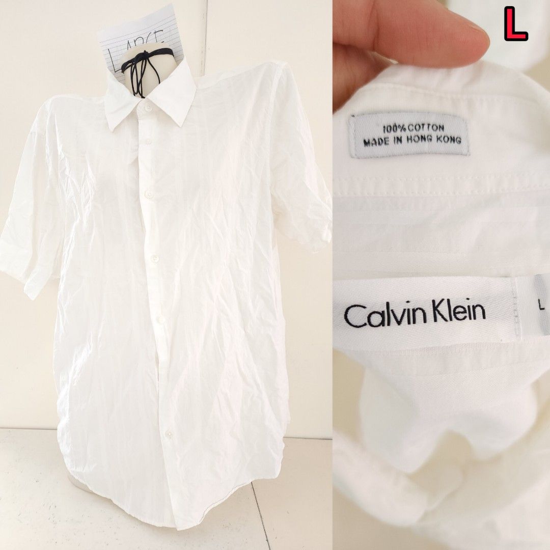 UNISEX Calvin Klein White Shirt, Men's Fashion, Tops & Sets, Tshirts & Polo  Shirts on Carousell